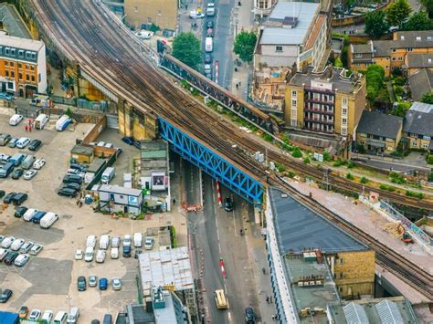 Premium Photo | Aerial view of railway bridge and buildings in city