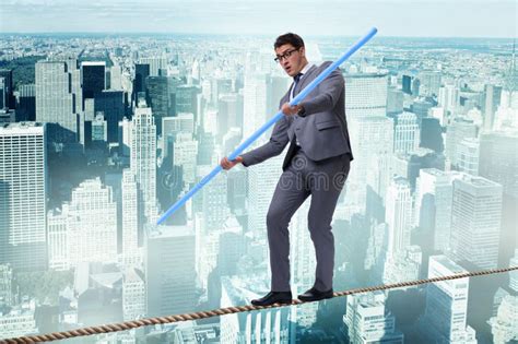 The Businessman Doing Tightrope Walking in Risk Concept Stock Image ...