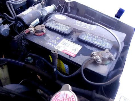 Car Battery Installation - AxleAddict