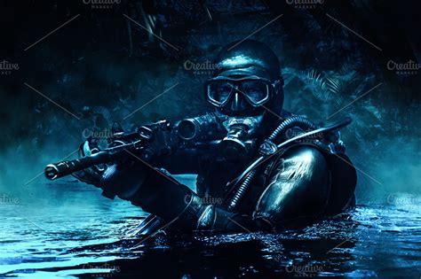 Frogman with weapons ~ People Photos ~ Creative Market