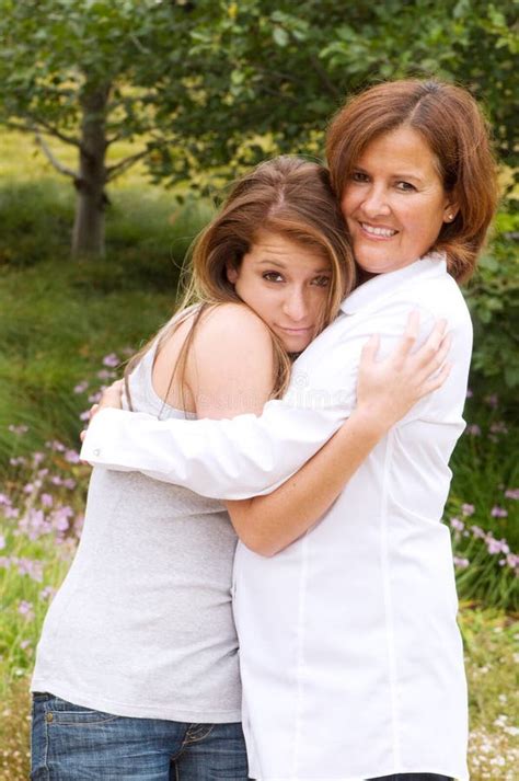 Mom Receiving Hug stock image. Image of beautiful, pretty - 15273005