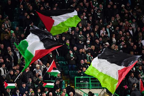 Celtic fans risk Uefa sanctions after displaying Palestine flags at ...