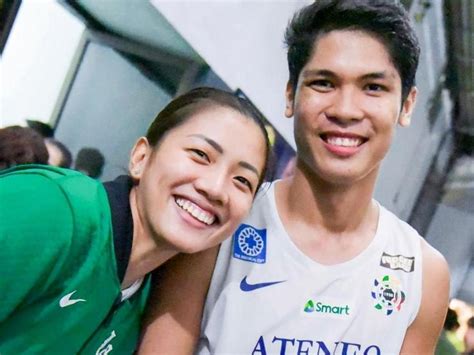 DLSU volleybelle Kianna Dy cheers up her beau Marck Espejo after Ateneo fails to win 4th UAAP ...