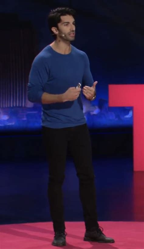 Justin Baldoni—TED Talk. Long-sleeve blue top. Black slim jeans with ...