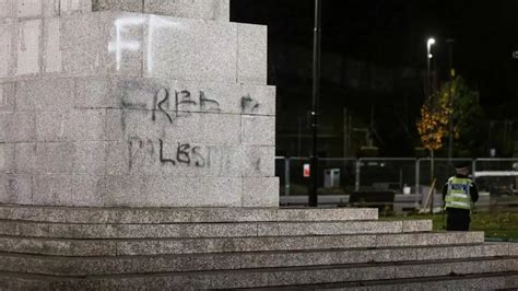 Police guard cenotaph in Rochdale after it was daubed with 'Free Palestine' graffiti - Saudi Press