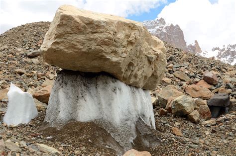 20 Huge Rock Balanced Precariously On An Ice Penitente On The Gasherbrum North Glacier In China