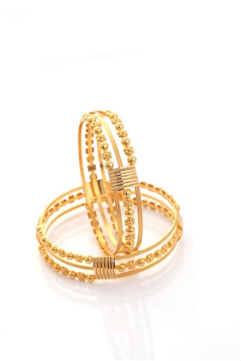 Indian Jewellery and Clothing: Beautiful diamond and gold bangles from NAC jewellers..