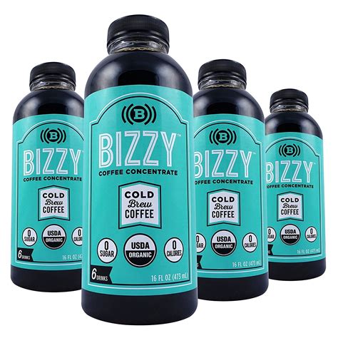 four bottles of bizzy coffee concentrate sitting next to each other