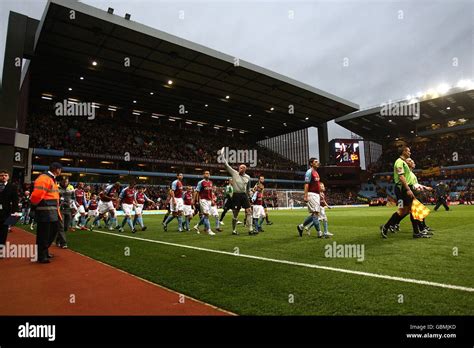 Aston Villa goalkeeper Brad Friedel (centre) waves to the crowd as the ...