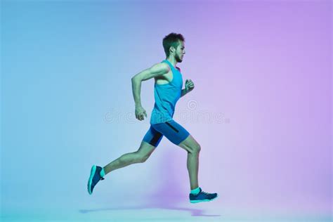 Full Length Portrait of Active Young Caucasian Running, Jogging Man on ...