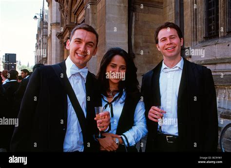 Oxford University Students in subfusc (traditional garb) drinking ...