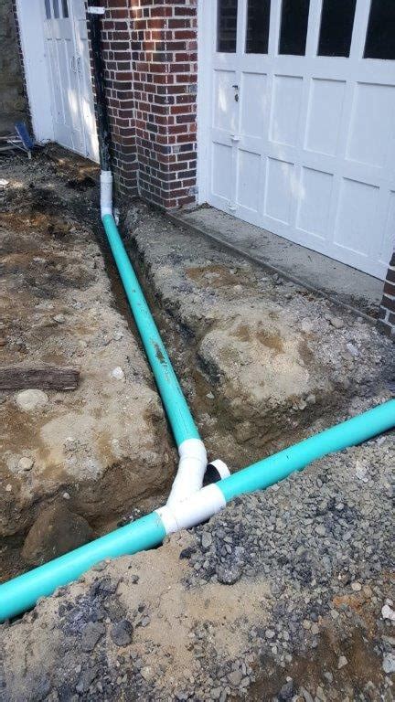 Drain Systems/Garage Floors | Masonry Works Construction Inc.