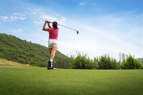 Young women player golf swing shot on course in morning sunrise 8035701 ...