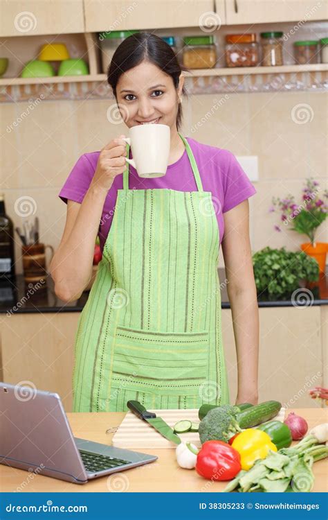 Woman Drinking Coffee in Her Kitchen Stock Image - Image of beautiful ...