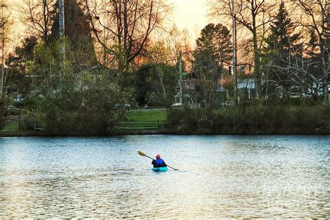 Blissful Blue Canoe at Sunset Photograph by Marie-Elaina Reichle HCA CPhT - Fine Art America