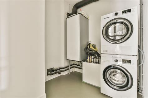 Premium Photo | A washer and dryer in a laundry room