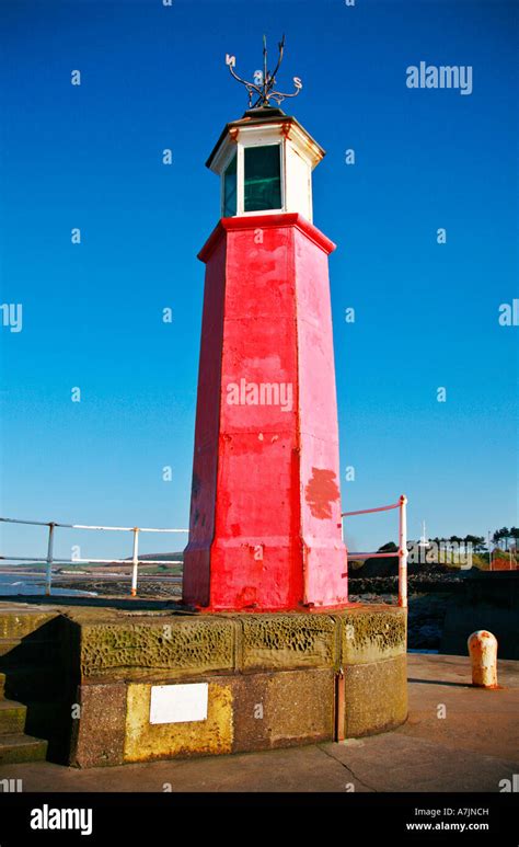 Watchet lighthouse guards the entrance to Watchet harbour in West Somerset Stock Photo - Alamy