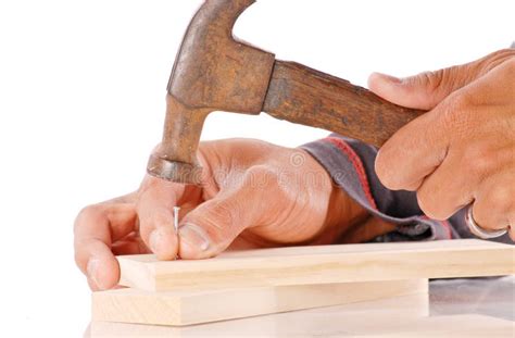 Hammering A Nail Stock Photography - Image: 20329872