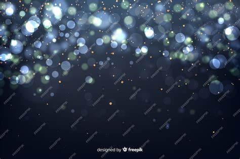 Free Vector | Golden particles background in bokeh style