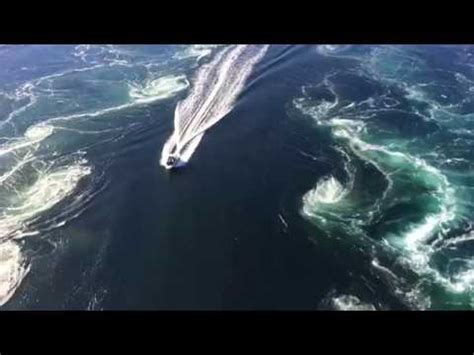 Boat cruising through Saltstraumen maelstrom near Bodø Norway - YouTube