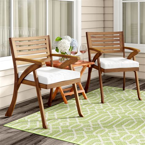 Winston Porter Brizio Patio Dining Chair with Cushion & Reviews | Wayfair