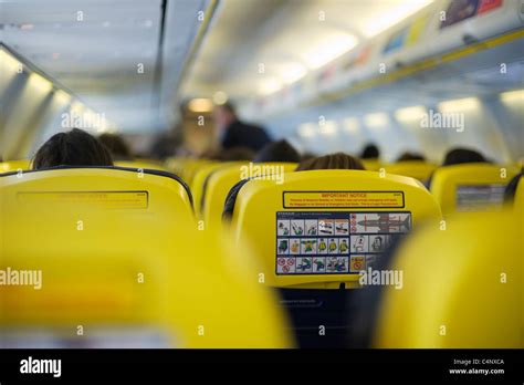 Ryanair Boeing 737-800 interior view with passengers, shallow DOF Stock Photo - Alamy