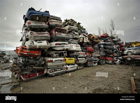 Car breakers yard New Zealand Mainly Japanese cars stacked high after ...