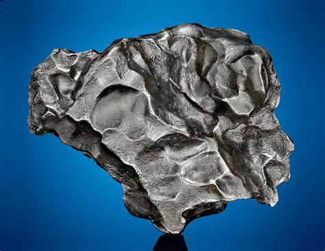 SIKHOTE ALIN METEORITE — AN ENGAGING PALM-SIZED METEORITE, Iron, coarse ...