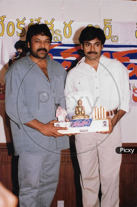 Image of Telugu Film Actor Chiranjeevi with Pawan Kalyan in a Movie Function-TT604658-Picxy