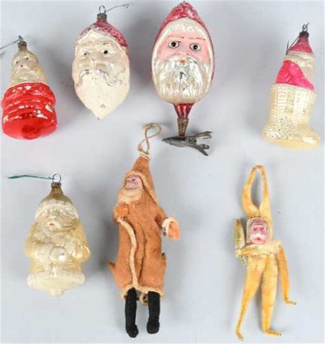 7-VINTAGE SANTA CLAUS ORNAMENTS