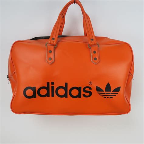 Vintage Adidas sports bag in orange imitation leather - Retroriek