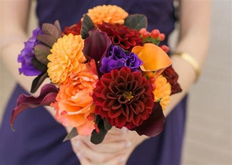Image result for orange red purple bouquet | Orange purple wedding, Wedding flowers, Bridesmaid ...