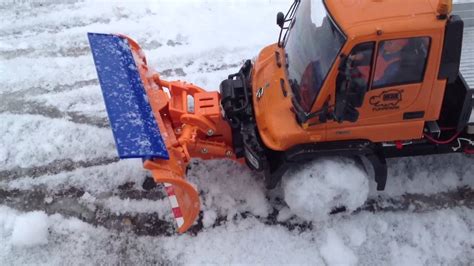 Unimog snow plough - YouTube