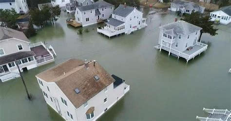 Flooding fears force Massachusetts residents from their homes - CBS News