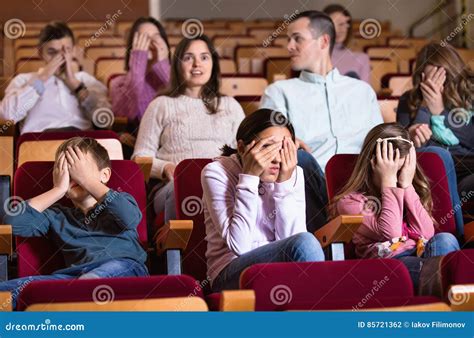 Group of People Watching Scary Movie Stock Photo - Image of comfort ...