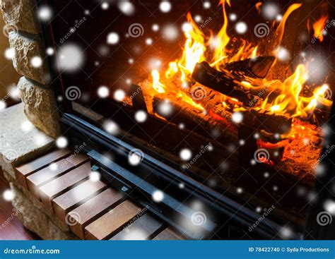 Close Up of Burning Fireplace with Snow Stock Photo - Image of flaming, light: 78422740