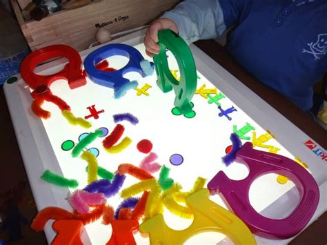 Learning and Exploring Through Play: 7 Activities for the Light Table