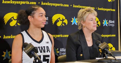 Lisa Bluder and Hannah Stuelke talk after beating the Buckeyes