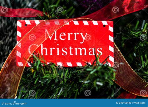 Merry Christmas Sign Hanging in the Christmas Tree Stock Photo - Image of hanging, colorful ...