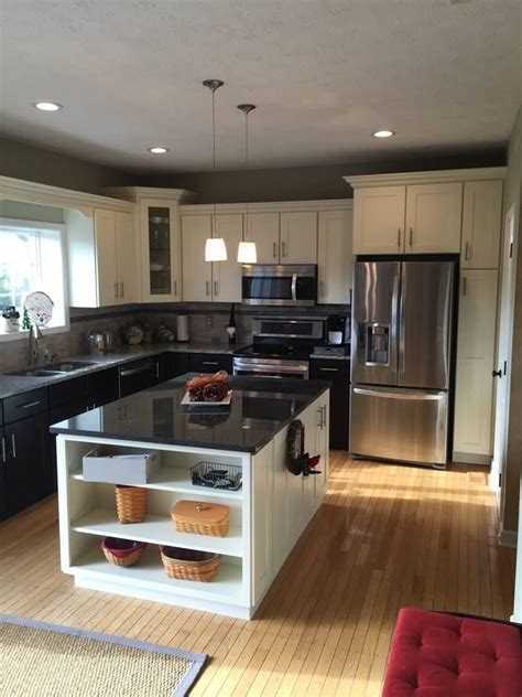 Centered island in a standard 10x10 kitchen. This kitchen is outfitted with Deerfield pre-bui ...