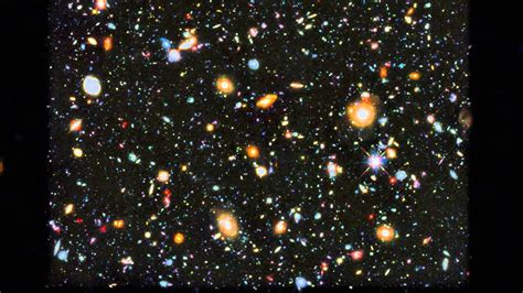 Zoom and pan of Hubble's colourful view of the Universe - YouTube