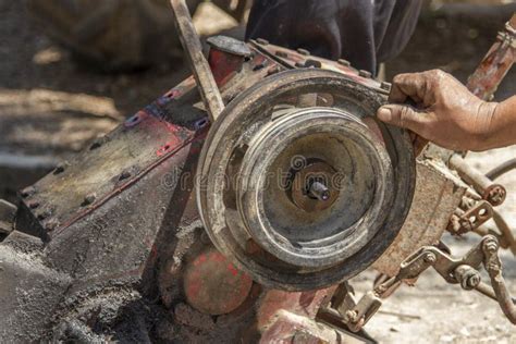 Pulley Belt of a Small Old Tractor Stock Image - Image of circle, metal: 161809519