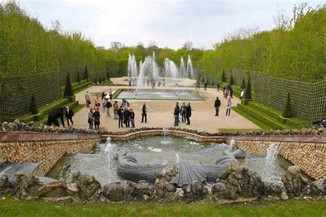 See the Fountains in the Gardens of Versailles Palace