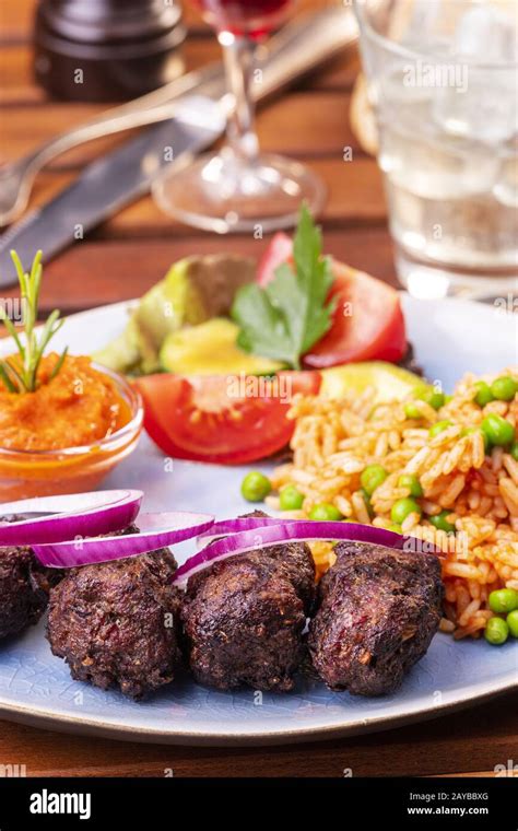 Close-up of Cevapcici with Djuvecreis Stock Photo - Alamy