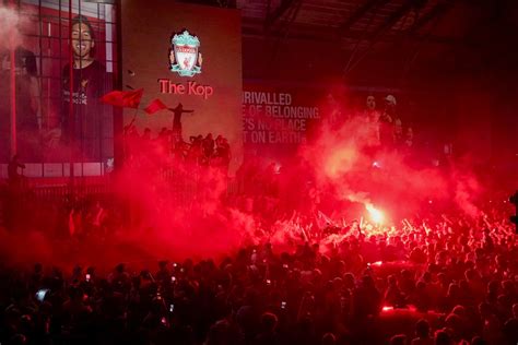 Liverpool fans erupt with joy after securing title after three-decade wait