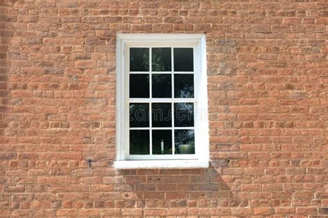 Window in a brick house stock photo. Image of house, home - 99116138