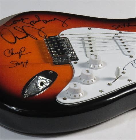 Charitybuzz: Styx Signed Squier Electric Guitar