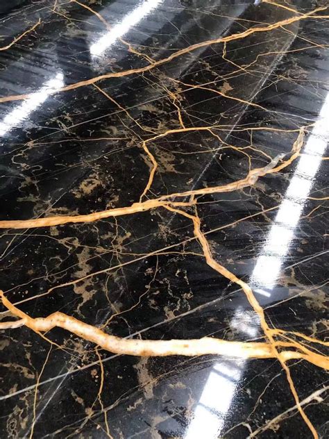 Download Black And Gold Marble Floor Wallpaper | Wallpapers.com