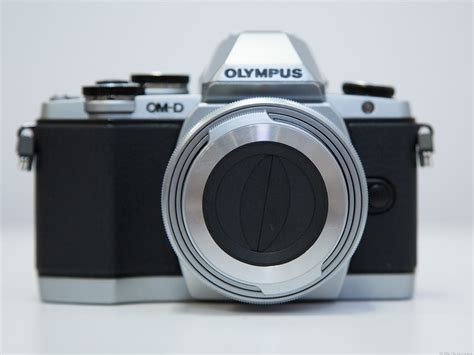 Olympus debuts new lenses (pictures) - CNET