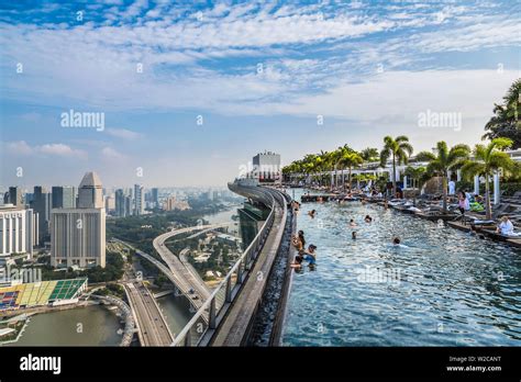 Infinity Pool & Singapore skyline at dusk, Marina Bay Sands Hotel, Singapore Stock Photo - Alamy